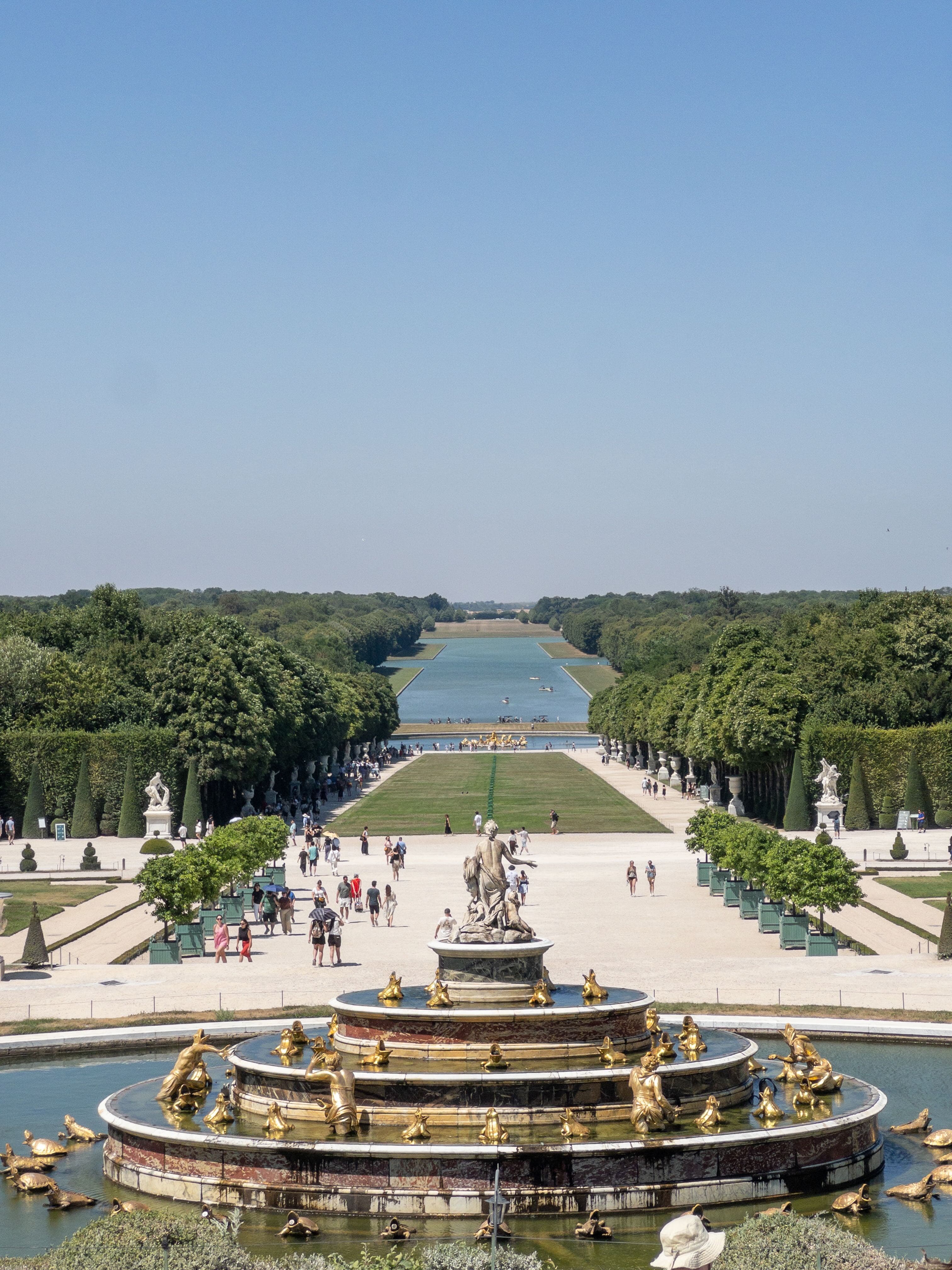 Formal gardens looking out over a long canal